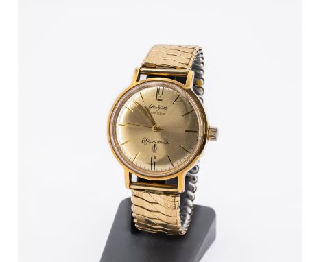 GUBChronometer. Herkunft: Deutschland, Glashütte. Werk: Handaufzug. Gehäuse/Armband: Messing, Stahl-Boden, Stahl Armband felx