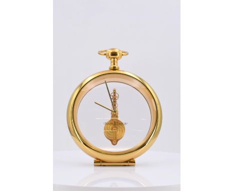 KLEINE TISCHUHR. Jaeger LeCoultre. Technik: Poliertes, vergoldetes Messinggehäuse, vorne Glas, hinten Kunststoff. Beschreibun