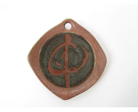JOHN LEACH (1939-1921) A studio pottery wall plaque with abstract design for Muchelney Pottery, impressed potters marks to re