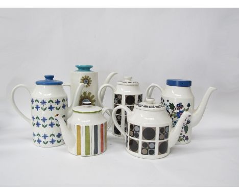 A collection of Meakin and Midwinter coffee pots and tea pots including Roselle, Focus and Mexicana 