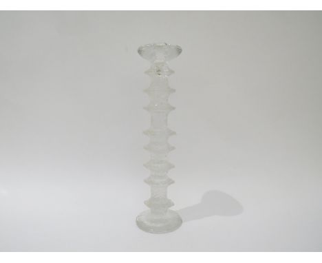 An Iittala of Finland 'Festivo' eight ring candlestick designed by Timo Sarpaneva. 32cm high