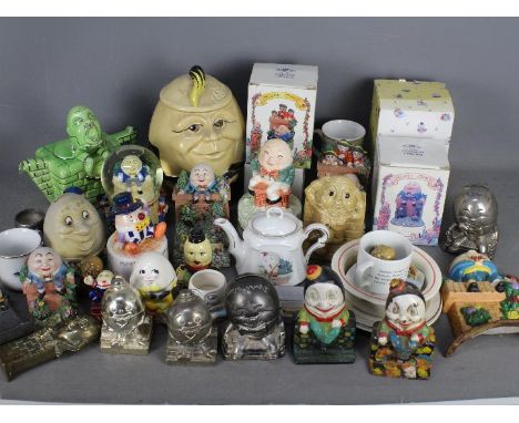 A collection of items relating to Humpty Dumpty to include teapot, biscuit barrel, ceramics, money banks, table wares and sim