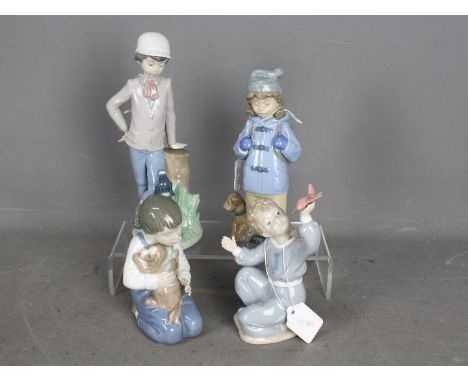 Nao - Four unboxed figurines of children with pets and toys, largest approximately 23 cm (h). [4]