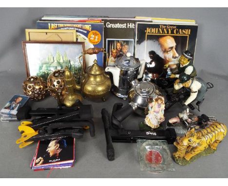 Lot to include a quantity of vinyl records, guitar stands, Laurel and Hardy figurines, Frevd teaball teapot and similar.