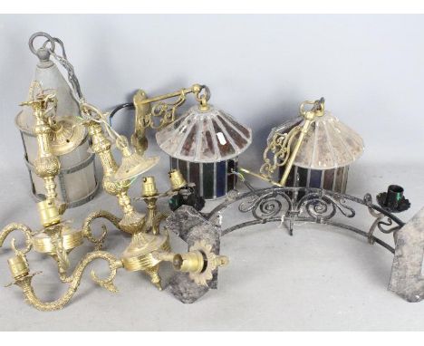 Lighting to include a pair of coloured glass lanterns, a pair of brass three branch chandeliers and similar.