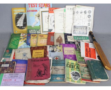 Lot to include scouting related ephemera, manuals and similar, cricket related publications and ephemera, cricket bat with fa