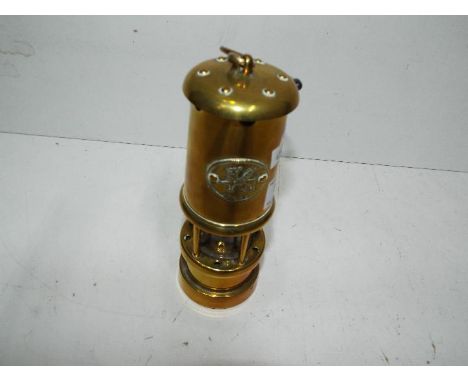 A brass miners lamp, approx 23 cm
