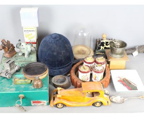 Lot to include cartridge belt, ceramics, plated ware, ceramic table lighters, coffee grinder, pool cue and similar. [2]