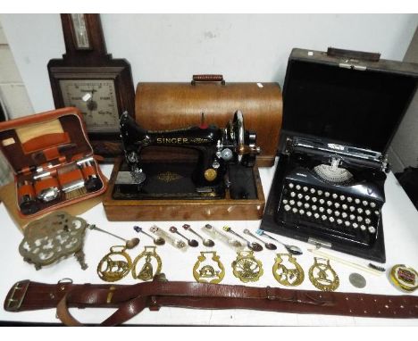 A good mixed lot to include Barometer, Singer sewing machine with case and key, Triumph Durabel typewriter, Two Tix gents van