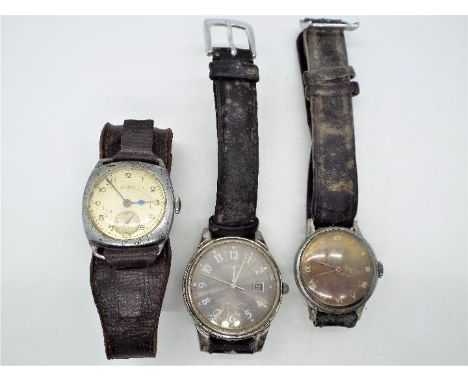 Three vintage wristwatches comprising a Tissot, Tempex and Timex.