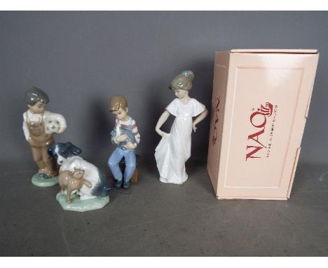 Nao - Four boxed figurines of children and animals, largest approximately 22 cm (h). [4]