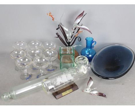 Mixed glassware to include rolling pin, ship in bottles, vintage Babycham glasses and similar.