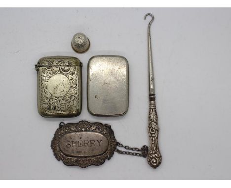 Lot to include a silver handled button hook, silver Sherry bottle label, silver thimble, two white metal / plated vesta cases