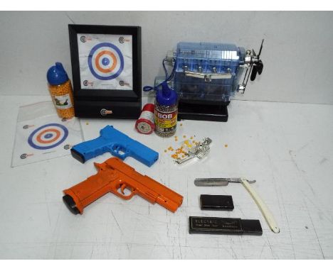 BB Guns and Trends Replica internal combustion engine model. Blue Galaxy hand gun and a larger Orange pistol. 2 x containers 