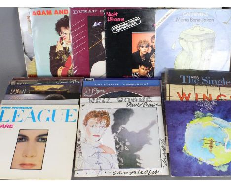 A quantity of 12" vinyl records to include Adam And The Ants, Duran Duran, Cat Stevens, Elton John, Michael Jackson, The Huma