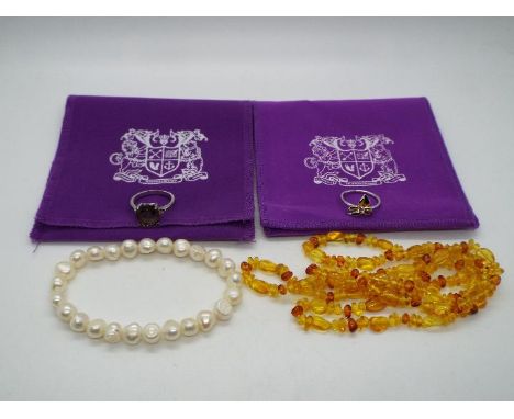 Lot to include two stone set, silver rings, the one with larger stone size O+½, the other L+½, a pearl bracelet and similar.