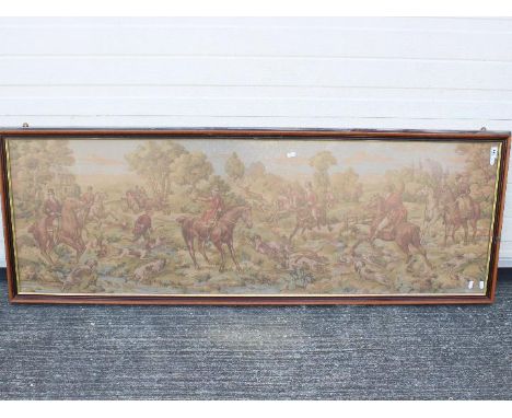 A framed tapestry depicting a hunting scene, approximately 55 cm x 152 cm.