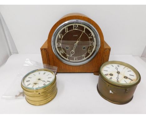 An rt Deco style oak cased electric Enfield mantle clock and and two antique brass circular ships clocks. No keys. 