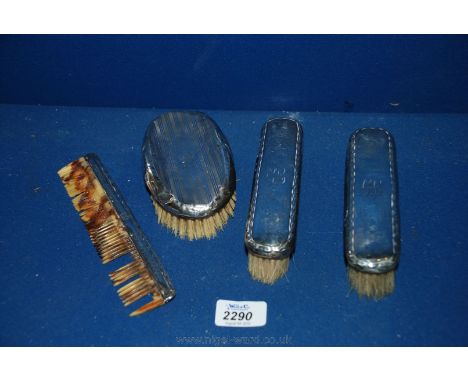 A set of Silver backed Hairbrushes and a Comb, a/f
