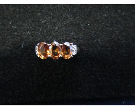 9ct Gold ring set with 3 orange stones &amp; diamonds Size O