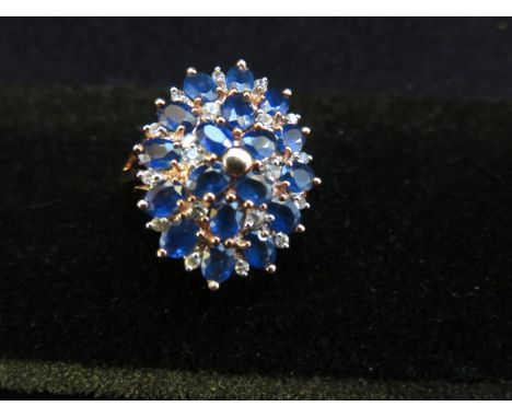 9ct Gold cluster ring set with blue &amp; white stones Size V