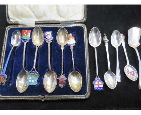 Collection of silver &amp; enamel spoons together with others