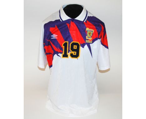 A white Scotland International short-sleeved shirt No.19, with button-up collar and embroidered badge, inscribed The Scottish