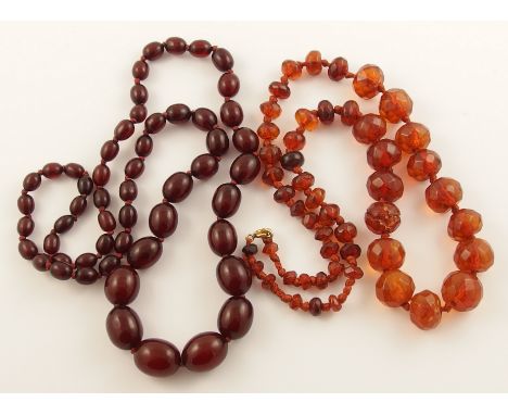 A string of facet cut orange amber coloured beads tapered in size from 16mm x 13.5mm, to 6mm x 4.4mm, the clear to opaque swi