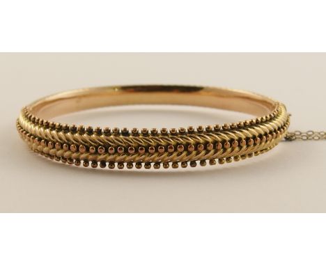 A Victorian yellow metal bangle with beaded detail, diameter across the centre approx 60mm
