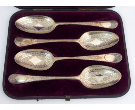 A cased harlequin set of four Georgian silver tablespoons by Thomas Toward, London 1774, R. P. London 1779, M J, London 1787 