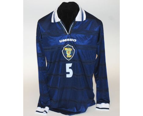 A blue Scotland International shirt No.5, with button-up collar and embroidered cloth badge, inscribed The Scottish Football 