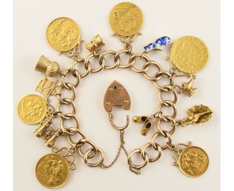 A 9ct gold charm bracelet  hung with three full gold sovereigns dated 1876, 1896, 1913, all with soldered on mounts, two half