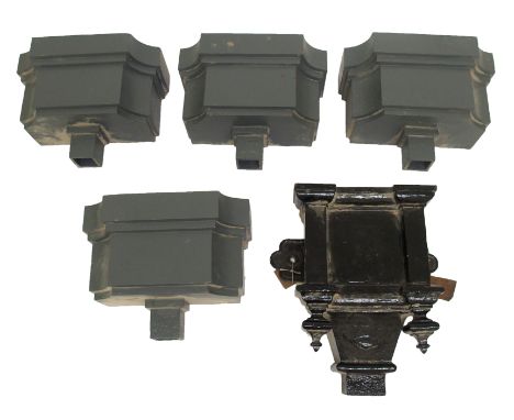 A Victorian cast iron rain hopper 51cm high and four modern cast iron hoppers (5)