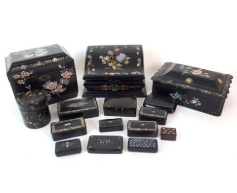 A group of Victorian black lacquered mother of pearl and metal inlaid boxes comprising; tea caddy, writing box, jewellery box