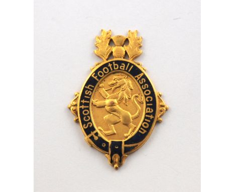 The following lot relates to the career of Celtic and Scotland International John "Yogi" Hughes A 9ct gold and enamel 1969-70