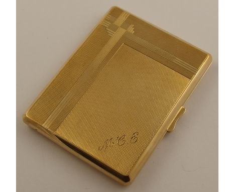 A 9ct gold Art Deco cigarette case with all over machine engraving with an Art Deco design, hallmarked in Chester 1935, with 