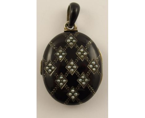 A Victorian black enamel and pearl locket with continental hallmarks to both sides of the locket and the hanging loop, dimens
