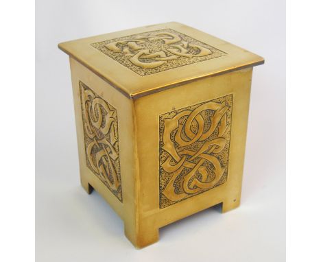 A Celtic revival brass tea caddy in the style of Alexander Ritchie the square section caddy decorated with repousse rectangul