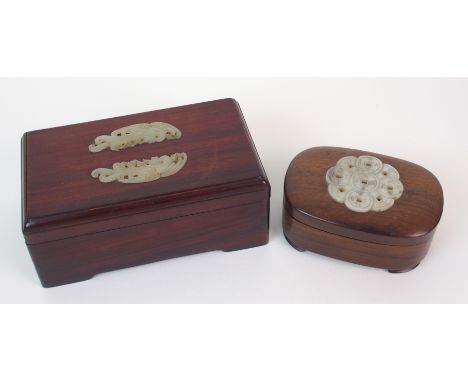 A Chinese hardwood rectangular box inset with two jade phoenix, 17cm wide and a box set with a jade cash medallion, 12cm wide