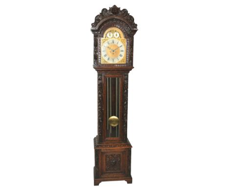 A Victorian oak longcase clock the brass face with silvered dial, chime/silent and strike/silent subsidiary dials, striking o