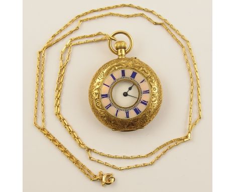 A ladies enamelled half hunter fob watch the outer chapter ring is enamelled in opalescent pale pink enamel with blue Roman n