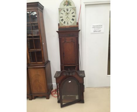 A 19th century oak longcase clock case: weight, pendulum and dial (no movement)