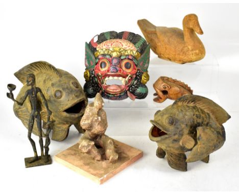 A collectors' lot to include a pair of Chinese-style ceramic models of koi carp, together with a carved and painted Thai mask