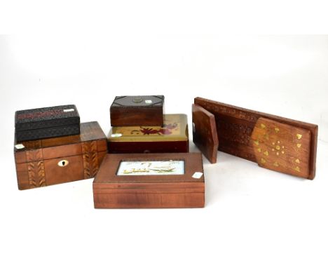 Five various trinket boxes comprising an Edwardian oak gentlemen's dressing table box with initialled cartouche, a lacquered 