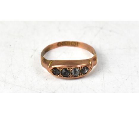 A Victorian 9ct rose gold ring with four pavé set old cut white stones, possibly sapphires, size O, approx 1.2g.
