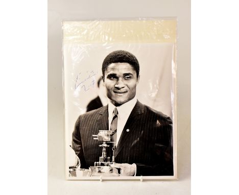 EUSÉBIO (DA SILVA FERREIRA); a black and white photograph of the footballing legend holding the Overseas Sports Personality o