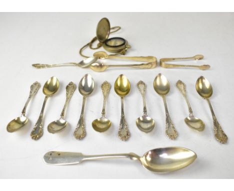 A set of eleven late 19th century Austro-Hungarian silver teaspoons and one non-matching spoon, combined approx 5.2ozt, a pla