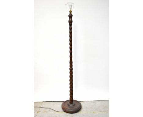 An early 20th century oak standard lamp, height 168cm. CONDITION REPORT Sold electrically untested.