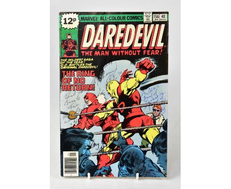 DAREDEVIL; a Marvel comic numbered 156, bearing the signatures of Muhammad Ali and Angelo Dundee to the cover.We have not aut