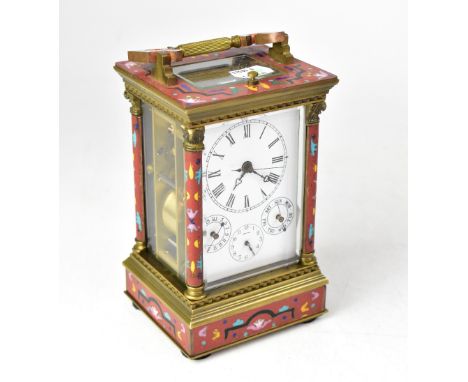 A reproduction brass and champlevé enamel decorated carriage clock with swing loop handle and white enamelled dial, height 18